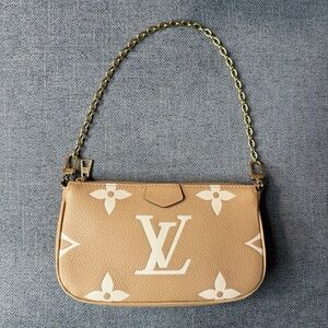 Louis Vuitton pochette accessoires bicolor arizona beige